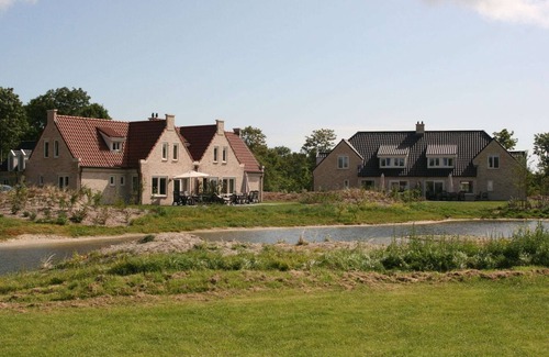 De Cocksdorp Villa | Amplia villa con chimenea decorativa en Texel