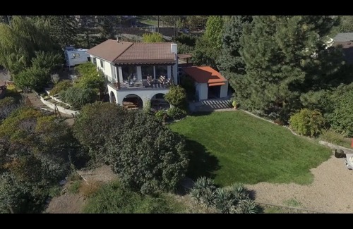 Okanagan-Similkameen Maison | Spanish Mid Century Villa with Wood Barrel Sauna