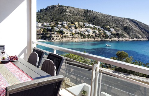 El Portet Appartement | Vues spectaculaires sur la mer d'Apt Frontline, à 2 minutes à pied de la plage / à 5 minutes de Moraira.