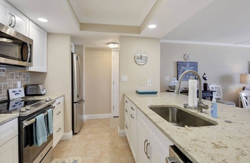East Wind South Copropriété | Condo en bord de mer * WiFi et parking gratuits * Piscine * Vélos * Court de tennis * Fournitures de plage * AC