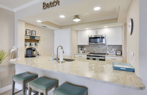 East Wind South Copropriété | Condo en bord de mer * WiFi et parking gratuits * Piscine * Vélos * Court de tennis * Fournitures de plage * AC
