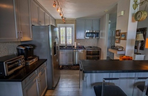 Savannah Sound Appartement | Vues spectaculaires sur la célèbre plage de Windermere