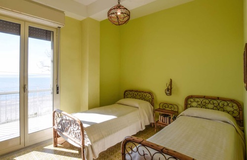 Bova Marina Maison | Spend an unforgettable vacation in this beautiful vacation home right on the beach.