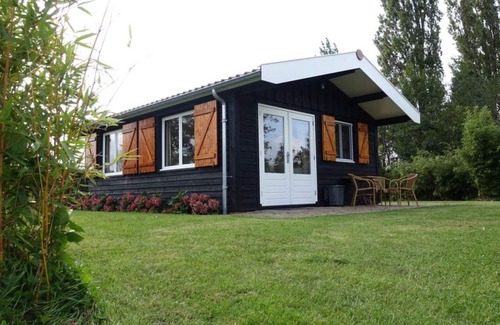 Vriezekoop Cottage | Passez la nuit sur l'eau dans Tiny House / Trekkershut Comfort / Mini Bungalow
