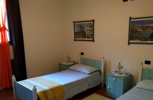 Giba Appartement | Splendid apartment in a semi-detached house, air conditioning. and large garden