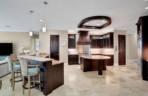 Edgewater Maison | Sprawling intercoastal home with boat lifts, pool and hot tub