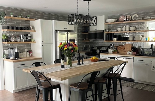 Cairo Autre | Spring Creek Farmhouse Luxury Family Retreat on 25 acre with direct river access