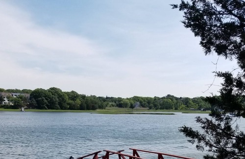 Gloucester Maison | Stanwood Point: Waterfront cottage with large screened porch, yard and dock