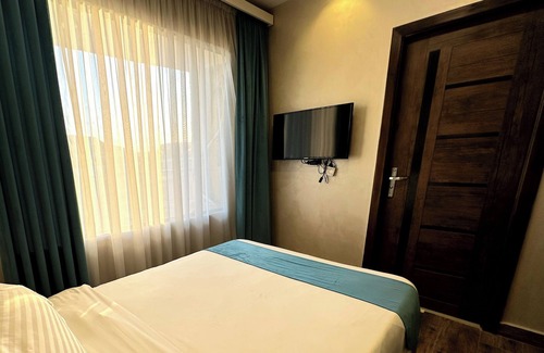 Giza Hôtel | "Stay in Luxury: Hotel Room with Stunning Grand Egyptian Museum View"