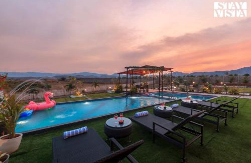 Bajarwadi Villa | StayVista at Mangifera Agro Estate with Pool, Wi-Fi