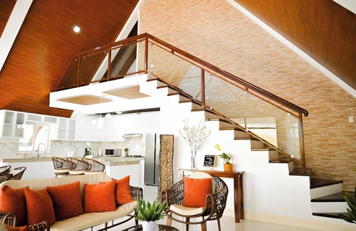 Bolinao Cabine | Step into an A-Frame home, where white tropical design meets ultimate comfort.