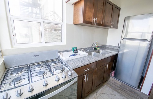 Costa Appartement | Steps from beach chic & modern1BD apt