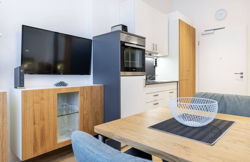 Wismar Appartement | Stilvolles 1-zimmer-apartment in Außergewöhnlicher Hafenlage im Maritimen Wismar