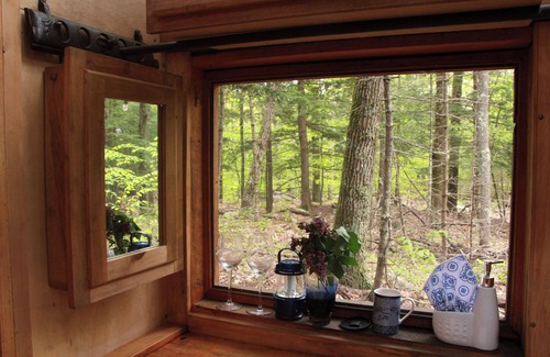 Canterbury Cabine | Stone Haven "Tent Cabin" with a cast iron fire pit in Canterbury, NH.