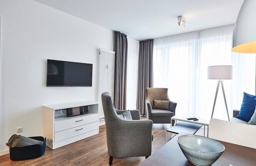 Bensersiel Appartement | Strandnahes, Modernes Apartment mit Terrasse Inkl. Schwimmbad- & Saunanutzung