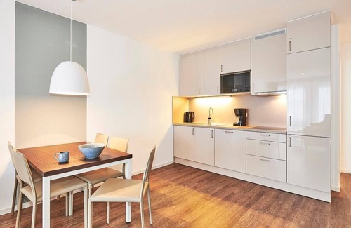 Bensersiel Appartement | Strandnahes, Modernes Apartment mit Westbalkon Inkl. Schwimmbad- & Saunanutzung