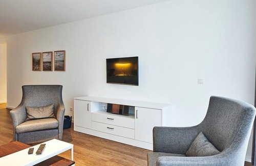 Bensersiel Appartement | Strandnahes, Modernes Apartment mit Westbalkon Inkl. Schwimmbad- & Saunanutzung