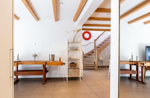 Neuhaus Maison | Strandhaus Hühnergott