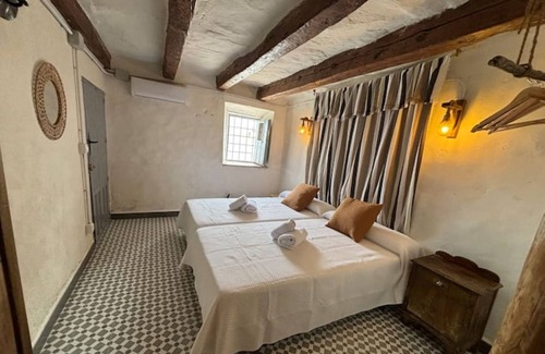 Iznatoraf Appartement | Studio Apartment 'Alojamiento Alberquina' with Shared Garden, Wi-Fi and Air Conditioning