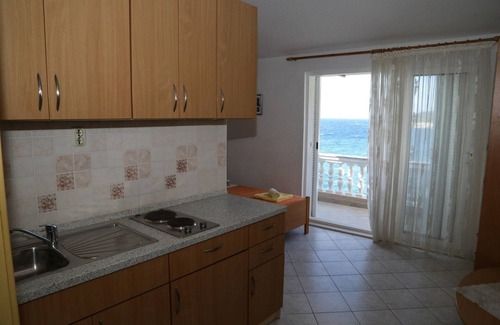 Milna Appartement | Garçonnière avec le balcon et la vue sur le mer Milna, Hvar (AS-22619-c)