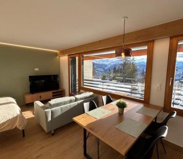Randogne Appartement | Studio moderne et cosy avec piscine et sauna