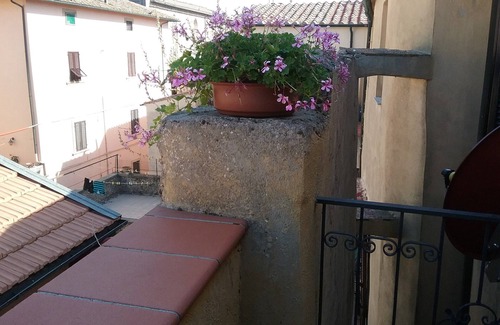 Massa Marittima Appartement | Studio avec balcon dans une ancienne maison de ville, dans un quartier calme et ensoleillé