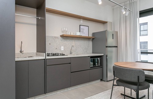 Centro Appartement | Studios Tower - Building near the postcard with swimming pool in the center of Floripa