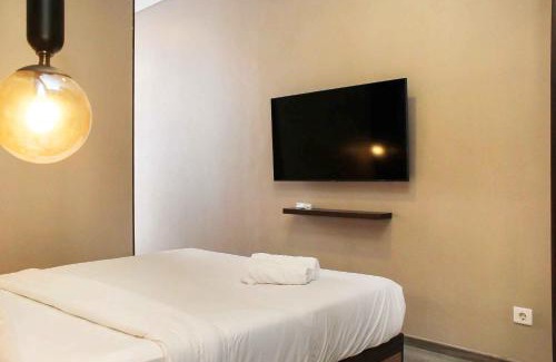 Bendungan Hilir Appartement | Stunning and Comfy 2BR + Study Room at Sudirman Suites Apartment By Travelio