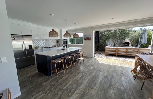 Papamoa Beach Maison | Stunning Family Home with Pool, Spa & Walk to Beach in Papamoa