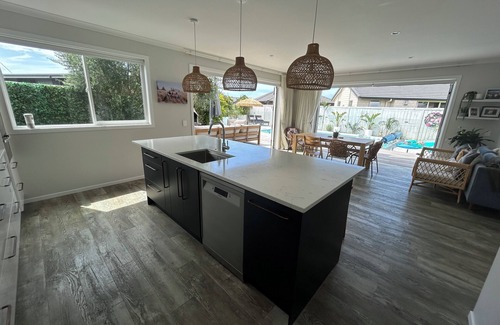 Papamoa Beach Maison | Stunning Family Home with Pool, Spa & Walk to Beach in Papamoa