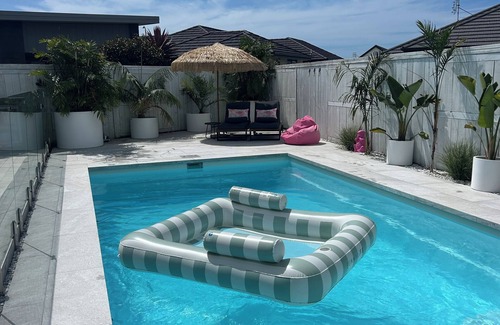 Papamoa Beach Maison | Stunning Family Home with Pool, Spa & Walk to Beach in Papamoa