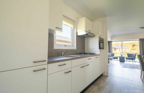 Biddinghuizen Maison | Belle maison de vacances privée pour 4 personnes avec piscine, WIFI, TV, terrasse et parking