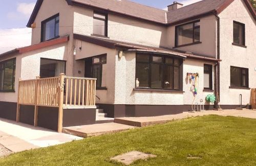 Glenariff Maison | Stunning views from The Bay, Glenariffe beach