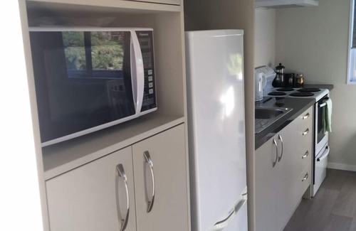 Tararua Forest Park Cottage | Incline Cottage, une vue imprenable, l'emplacement de la ferme.