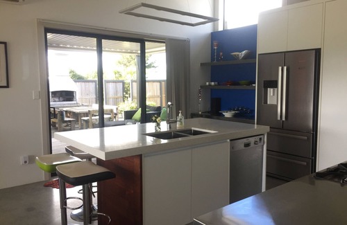 Martinborough Maison | Une vue imprenable sur les Tararuas à côté d'un vignoble avec des vues lointaines de la vigne