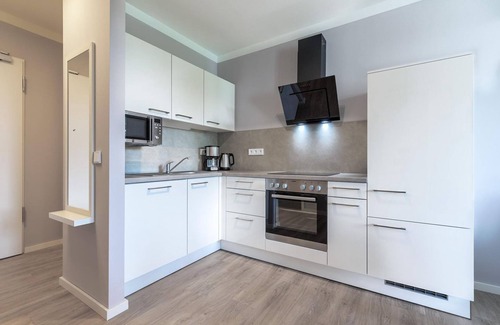 Alt-Travemunde/Ronnau Appartement | Stylish apartment with loggia, right by the park and only 300 meters to the Baltic Sea - Godewindpark