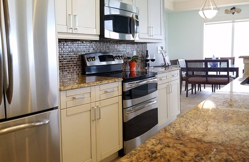 New Smyrna Beach Copropriété | Condo élégant face à la plage avec vue spectaculaire!