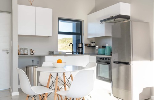 Mykonos Appartement | Stylish Urban Stay | Balcony | Lagoon View