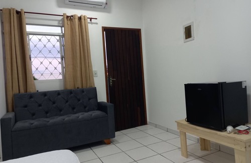 Centro Appartement | Suíte Casal, Cama Queen, ar Condicionado, Frigobar, TV com Wifi