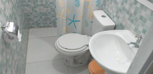 Praia da Enseada Appartement | Suíte externa com entrada independente