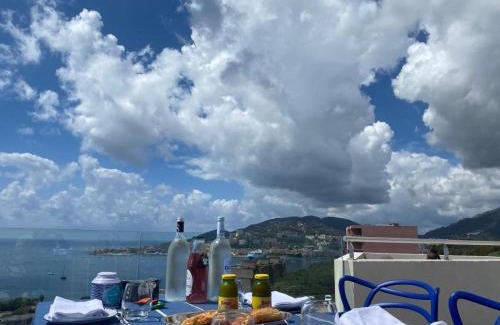 Le Ricanto Lit Et Petit-Déjeuner | Suite avec 2 chambres d'hôtes pour 1 à 4 personnes avec vue mer, terrasse, parking privé, proche port et aéroport, petit déjeuner inclus