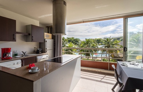 Arue Appartement | Tahiti Arue Suite F2 bord de mer accès offerts piscine spa salle de sport