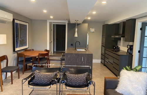 Highland Maison | Suite nestled in a garden beside a 13 acre park in the heart of the city.