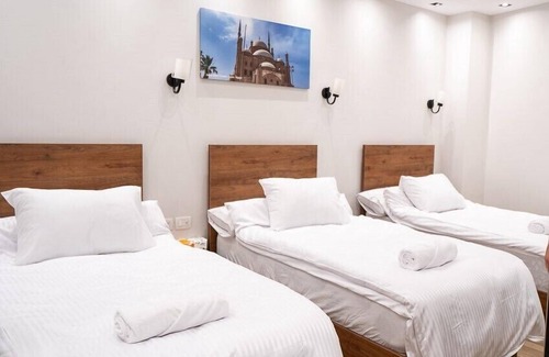 Al-'Umraniyah Lit Et Petit-Déjeuner | Sun and Sand Guest House