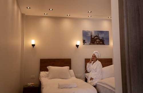 Al-'Umraniyah Lit Et Petit-Déjeuner | Sun and Sand Guest House