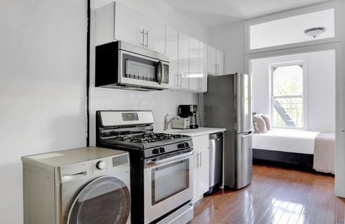 Chinatown Appartement | Sunlit LES 1BR w/ W/D, steps to B/D train, by Blueground