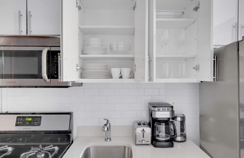 Chinatown Appartement | Sunlit LES 1BR w/ W/D, steps to B/D train, by Blueground