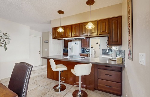Sunland Village Maison | Sunny home with covered patio, grill, pool, tennis, hot tub, full kitchen, & AC