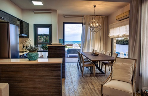 Mazotos Villa | Luxury beachfront villa with a private pool, yoga sessions and sea adventures
