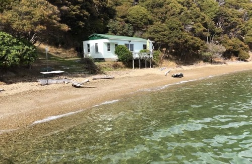 Whatamango Bay Cottage | Sunset Cottage right on the beach.